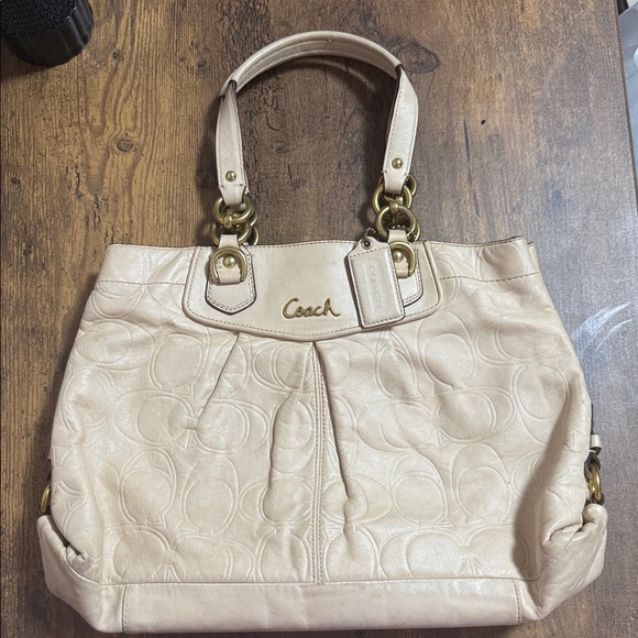Coach Handbags - Coach Beige Embossed Shoulder Bag
